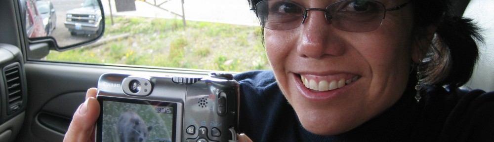Vicki and her prize photo of a grizzly bear